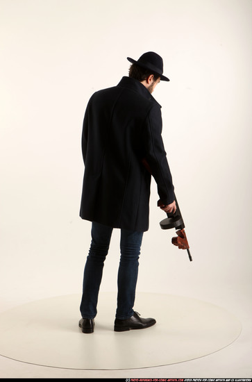 Man Adult Athletic White Fighting with submachine gun Standing poses Coat