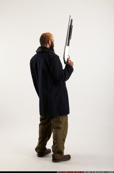 Man Adult Athletic White Standing poses Coat Fighting with shotgun