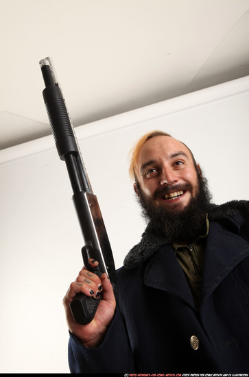 Man Adult Athletic White Standing poses Coat Fighting with shotgun