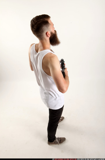 Man Adult Athletic White Fighting with submachine gun Standing poses Casual