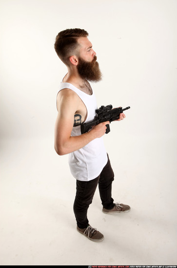 Man Adult Athletic White Fighting with submachine gun Standing poses Casual