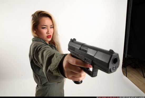 Woman Young Average Fighting with gun Standing poses Army Asian