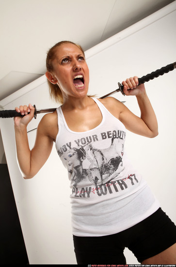 Woman Adult Athletic White Fighting with sword Standing poses Casual