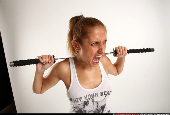 Woman Adult Athletic White Fighting with sword Standing poses Casual