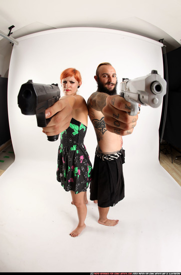 Man & Woman Adult Athletic White Fighting with gun Standing poses Casual