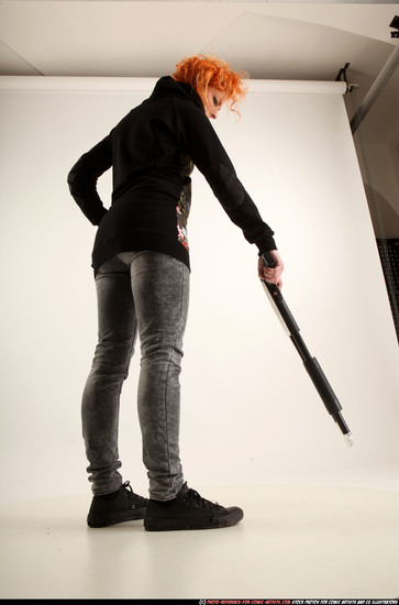 Woman Adult Athletic White Standing poses Casual Fighting with shotgun