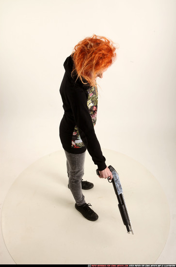 Woman Adult Athletic White Standing poses Casual Fighting with shotgun