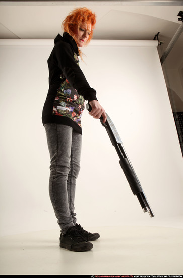 Woman Adult Athletic White Standing poses Casual Fighting with shotgun