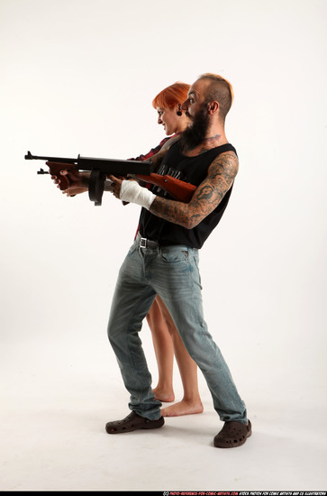 Man & Woman Adult Athletic White Fighting with submachine gun Sitting poses Casual