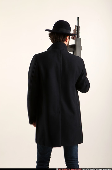 Man Adult Athletic White Fighting with submachine gun Standing poses Coat