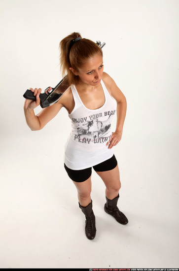 Woman Adult Athletic White Standing poses Casual Fighting with shotgun