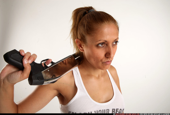 Woman Adult Athletic White Standing poses Casual Fighting with shotgun