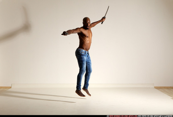 Man Adult Athletic Black Fighting with sword Moving poses Pants