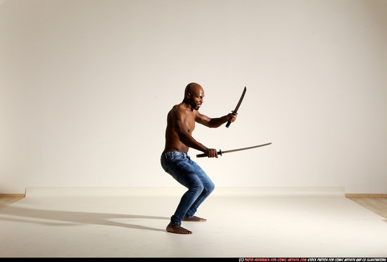 Man Adult Athletic Black Fighting with sword Moving poses Pants