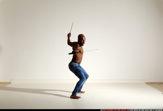 Man Adult Athletic Black Fighting with sword Moving poses Pants