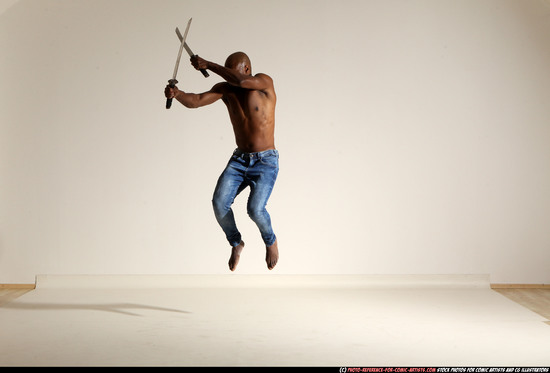 Man Adult Athletic Black Fighting with sword Moving poses Pants