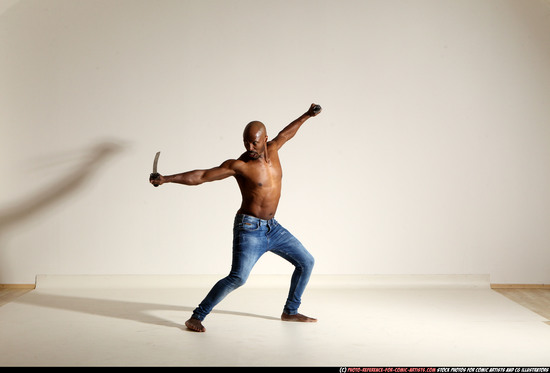 Man Adult Athletic Black Fighting with sword Moving poses Pants