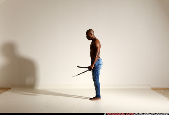 Man Adult Athletic Black Fighting with sword Moving poses Pants