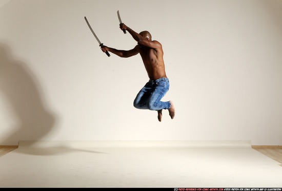 Man Adult Athletic Black Fighting with sword Moving poses Pants