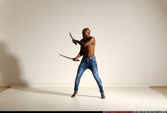 Man Adult Athletic Black Fighting with sword Moving poses Pants