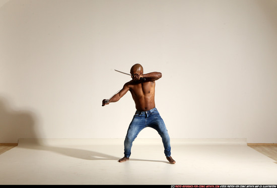 Man Adult Athletic Black Fighting with sword Moving poses Pants