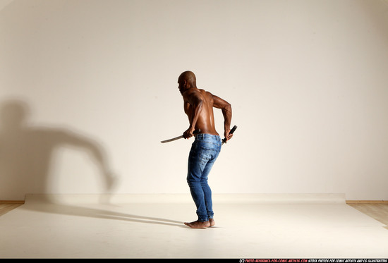 Man Adult Athletic Black Fighting with sword Moving poses Pants