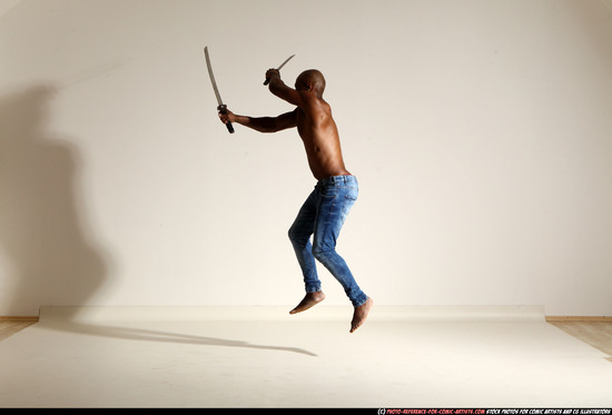 Man Adult Athletic Black Fighting with sword Moving poses Pants