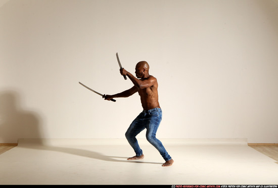 Man Adult Athletic Black Fighting with sword Moving poses Pants