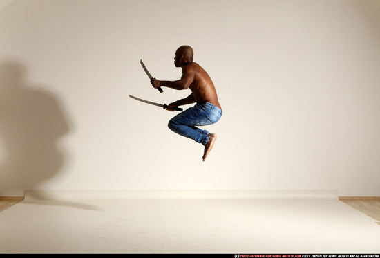 Man Adult Athletic Black Fighting with sword Moving poses Pants