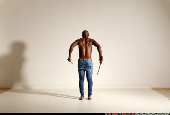 Man Adult Athletic Black Fighting with sword Moving poses Pants