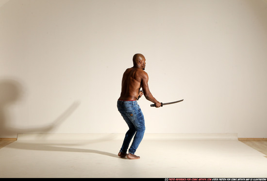 Man Adult Athletic Black Fighting with sword Moving poses Pants