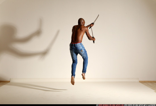 Man Adult Athletic Black Fighting with sword Moving poses Pants