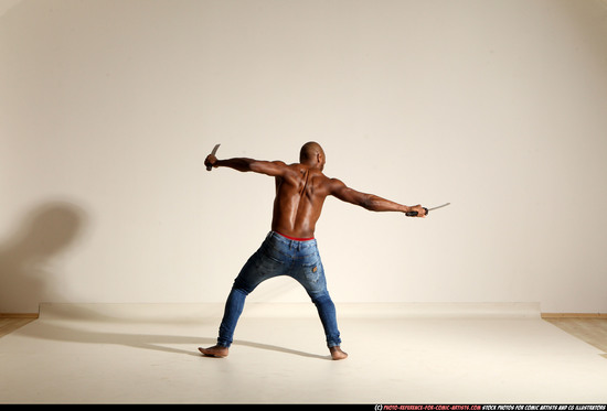 Man Adult Athletic Black Fighting with sword Moving poses Pants