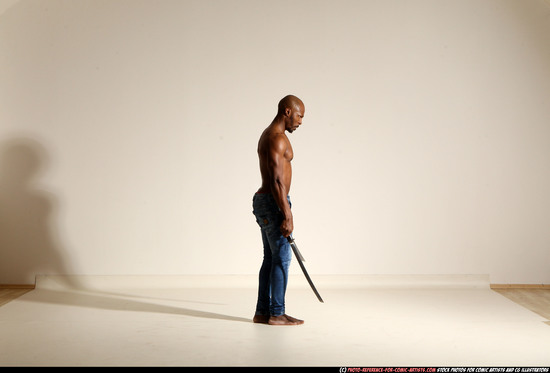 Man Adult Athletic Black Fighting with sword Moving poses Pants