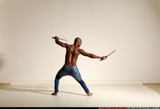 Man Adult Athletic Black Fighting with sword Moving poses Pants