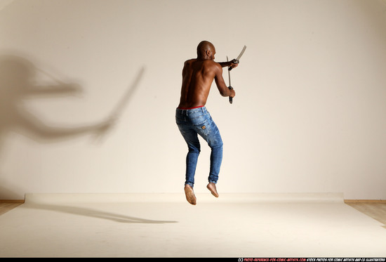 Man Adult Athletic Black Fighting with sword Moving poses Pants