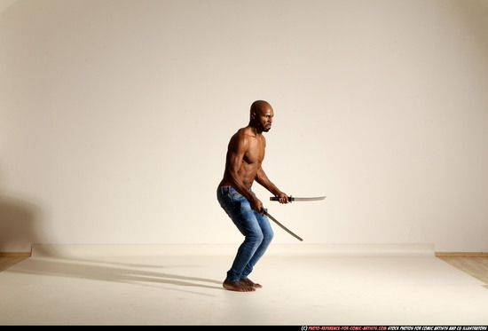 Man Adult Athletic Black Fighting with sword Moving poses Pants