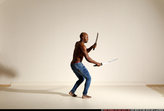 Man Adult Athletic Black Fighting with sword Moving poses Pants