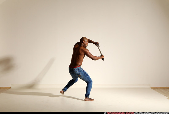 Man Adult Athletic Black Fighting with sword Moving poses Pants