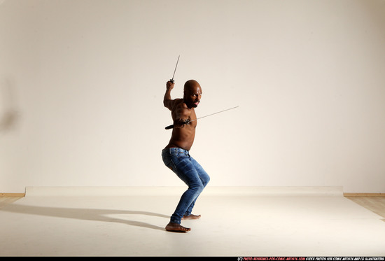 Man Adult Athletic Black Fighting with sword Moving poses Pants