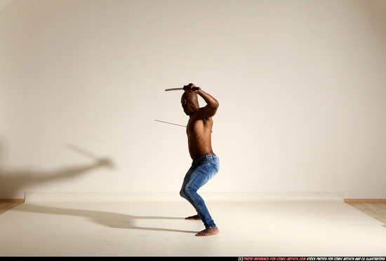 Man Adult Athletic Black Fighting with sword Moving poses Pants