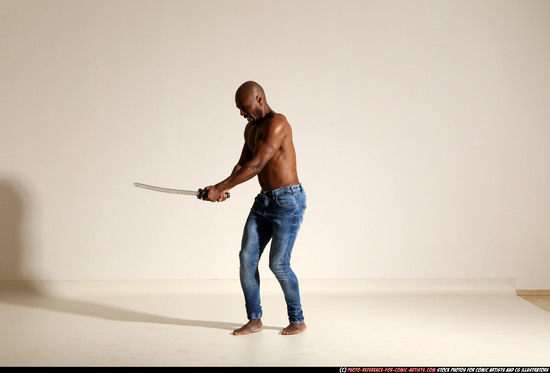 Man Adult Athletic Black Fighting with sword Moving poses Pants