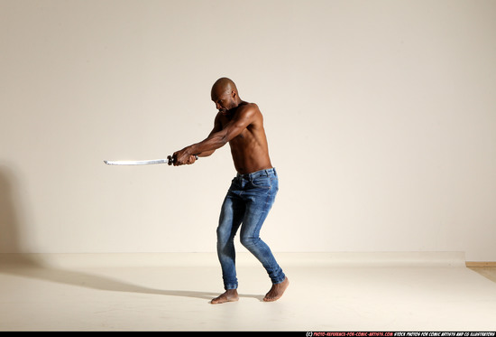 Man Adult Athletic Black Fighting with sword Moving poses Pants