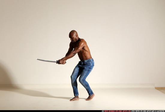 Man Adult Athletic Black Fighting with sword Moving poses Pants