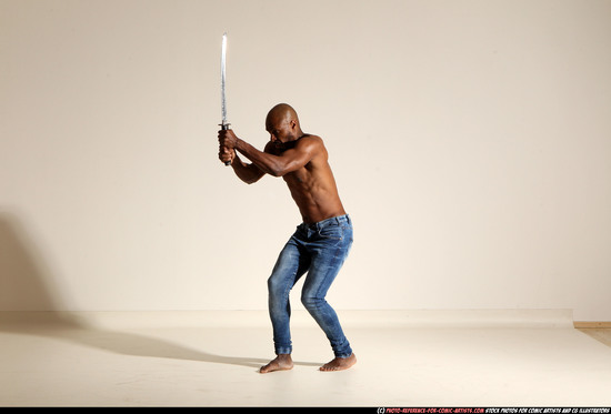 Man Adult Athletic Black Fighting with sword Moving poses Pants