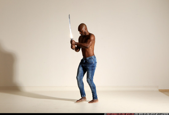 Man Adult Athletic Black Fighting with sword Moving poses Pants