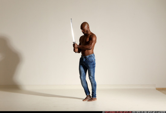 Man Adult Athletic Black Fighting with sword Moving poses Pants