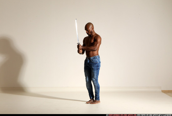 Man Adult Athletic Black Fighting with sword Moving poses Pants