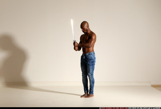 Man Adult Athletic Black Fighting with sword Moving poses Pants