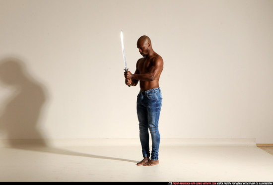 Man Adult Athletic Black Fighting with sword Moving poses Pants